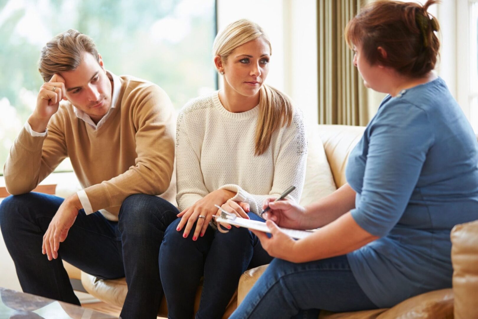 Couple receiving marriage counseling session.