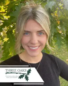 Smiling woman with blonde hair, Three Oaks logo.